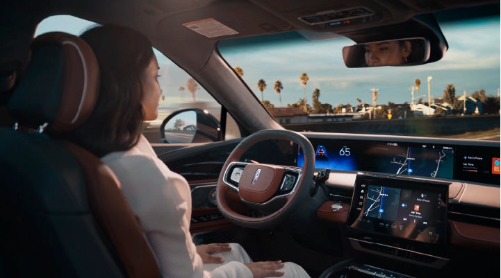 A person is shown driving hands-free on the highway with available Lincoln BlueCruise technology. | Joe Cooper Lincoln of Edmond in Oklahoma City OK