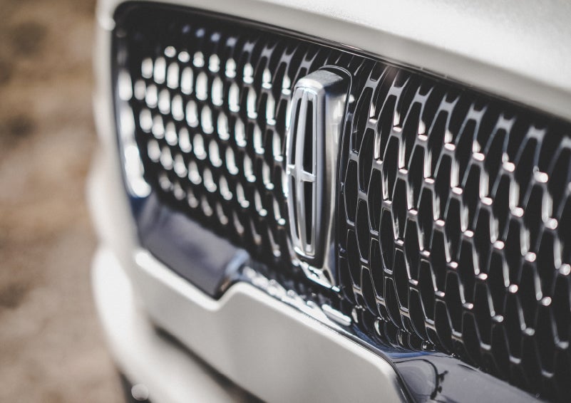 The grille of the 2024 Lincoln Aviator® Reserve model with an eye-catching repeated field of Lincoln Star logo shapes | Joe Cooper Lincoln of Edmond in Oklahoma City OK