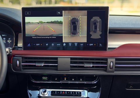 The driver of a 2024 Lincoln Corsair® SUV is shown selecting the drive mode. | Joe Cooper Lincoln of Edmond in Oklahoma City OK