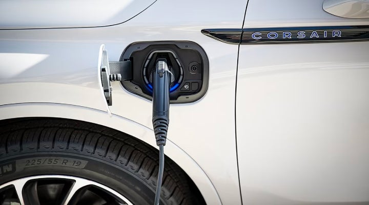 An electric charger is shown plugged into the charging port of a Lincoln Corsair® Grand Touring
model. | Joe Cooper Lincoln of Edmond in Oklahoma City OK